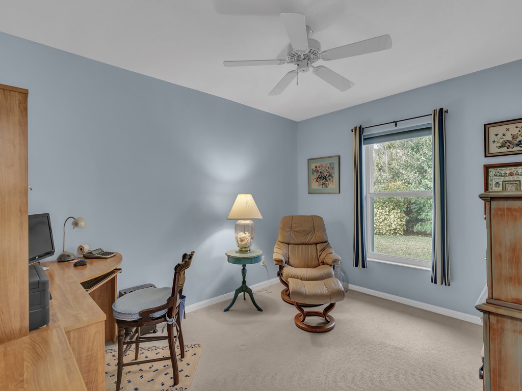 109 Thunderbird Drive Sebastian, FL 32958 - Photo 12 of 27 a living room with furniture and a window