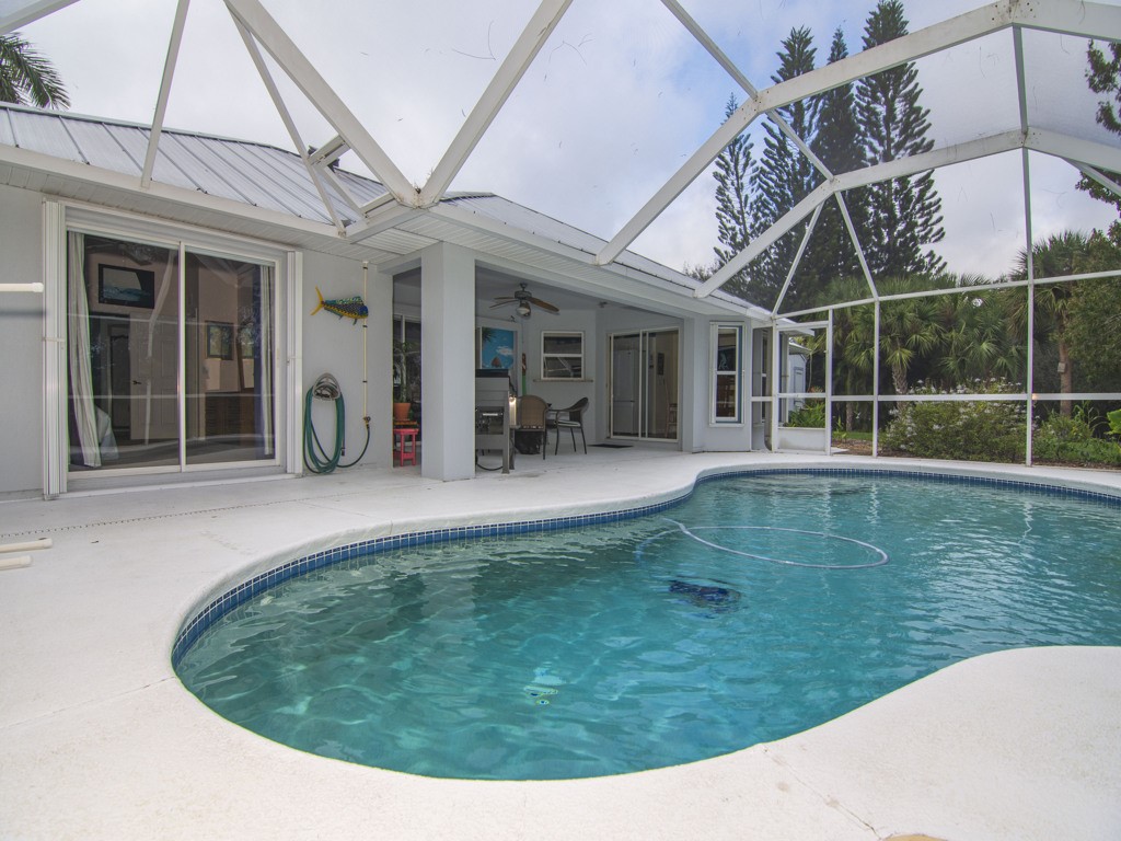 109 Thunderbird Drive Sebastian, FL 32958 - Photo 15 of 27 a view of a swimming pool with a patio