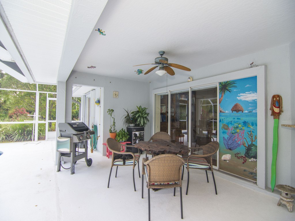 109 Thunderbird Drive Sebastian, FL 32958 - Photo 17 of 27 a living room with furniture and potted plants