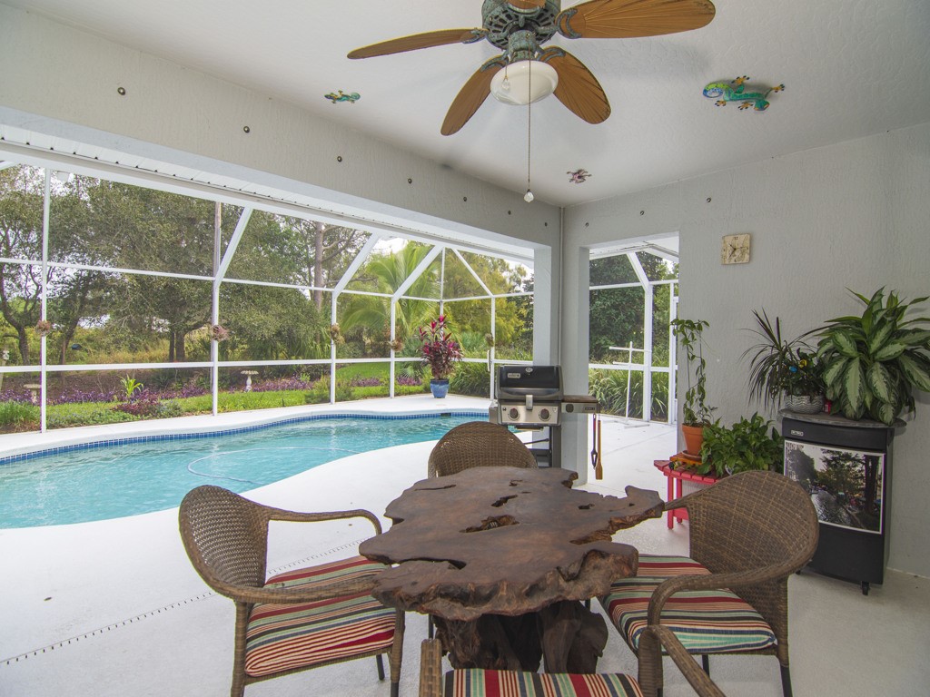 109 Thunderbird Drive Sebastian, FL 32958 - Photo 19 of 27 a living room with furniture and a large window