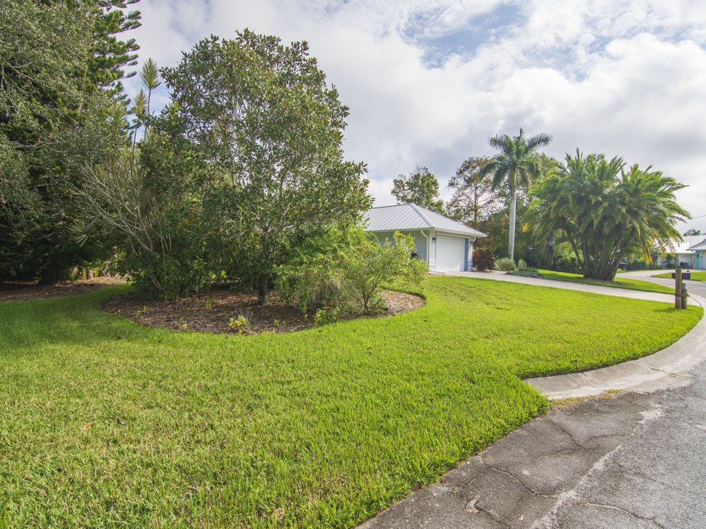 109 Thunderbird Drive Sebastian, FL 32958 - Photo 2 of 27 a view of a house with a swimming pool and a yard