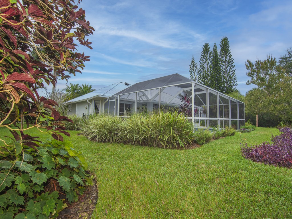 109 Thunderbird Drive Sebastian, FL 32958 - Photo 25 of 27 a view of a house with garden and plants