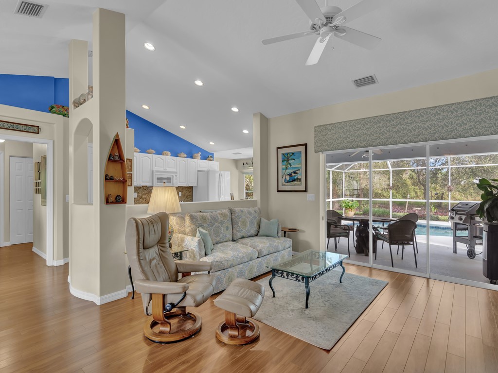 109 Thunderbird Drive Sebastian, FL 32958 - Photo 4 of 27 a living room with furniture and wooden floor