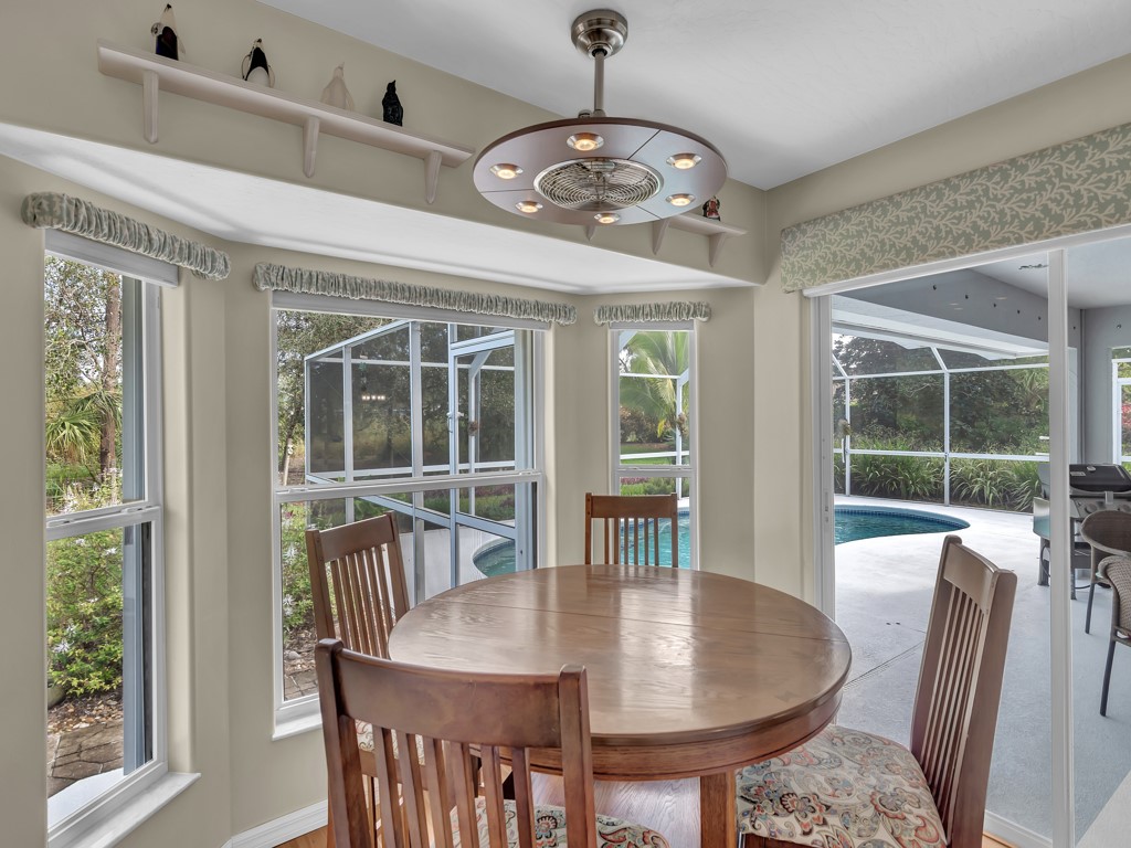 109 Thunderbird Drive Sebastian, FL 32958 - Photo 7 of 27 a view of a dining room with furniture window and outside view