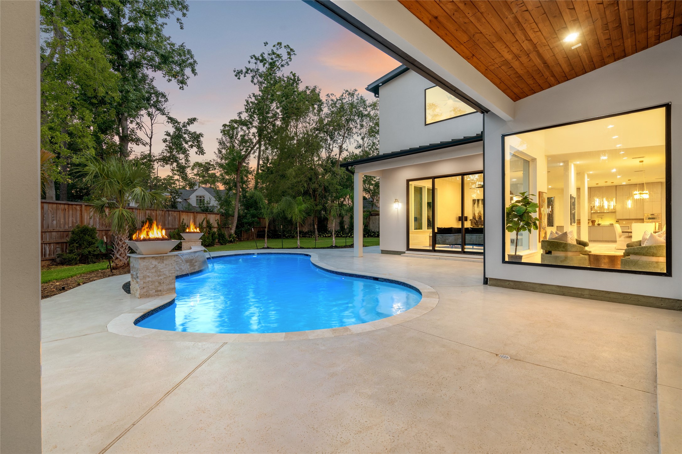 625 Piney Point Road Houston, TX 77024 - Photo 42 of 47 an outdoor space with swimming pool and furniture