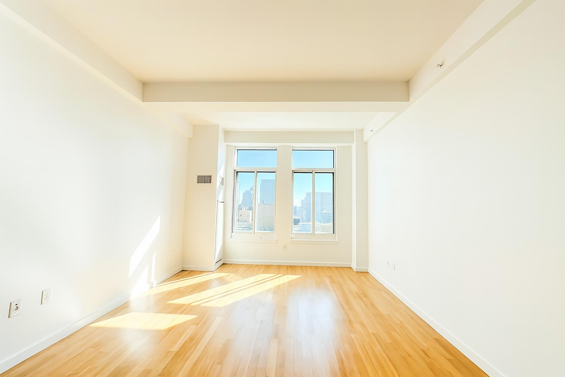 Undisclosed Address Brooklyn, NY 11201 - Photo 21 of 23 a view of empty room with wooden floor