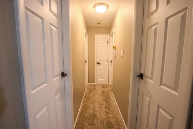 an empty room with a empty space and a window