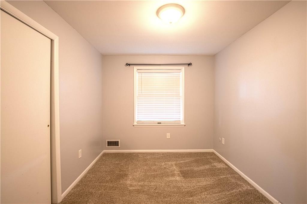 7 Lydia Drive Uniontown, PA 15401 - Photo 21 of 47 an empty room with a empty space and a window