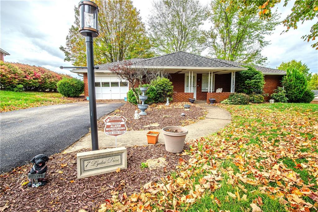 7 Lydia Drive Uniontown, PA 15401 - Photo 5 of 47 a front view of a house with garden