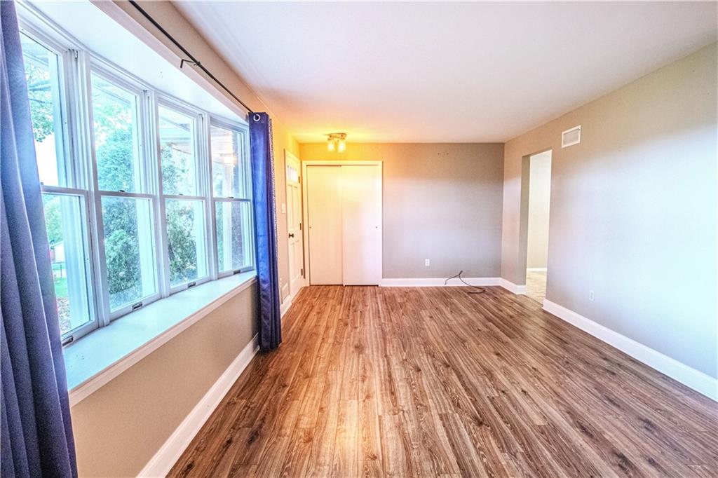 7 Lydia Drive Uniontown, PA 15401 - Photo 10 of 47 a view of an empty room with wooden floor and a window