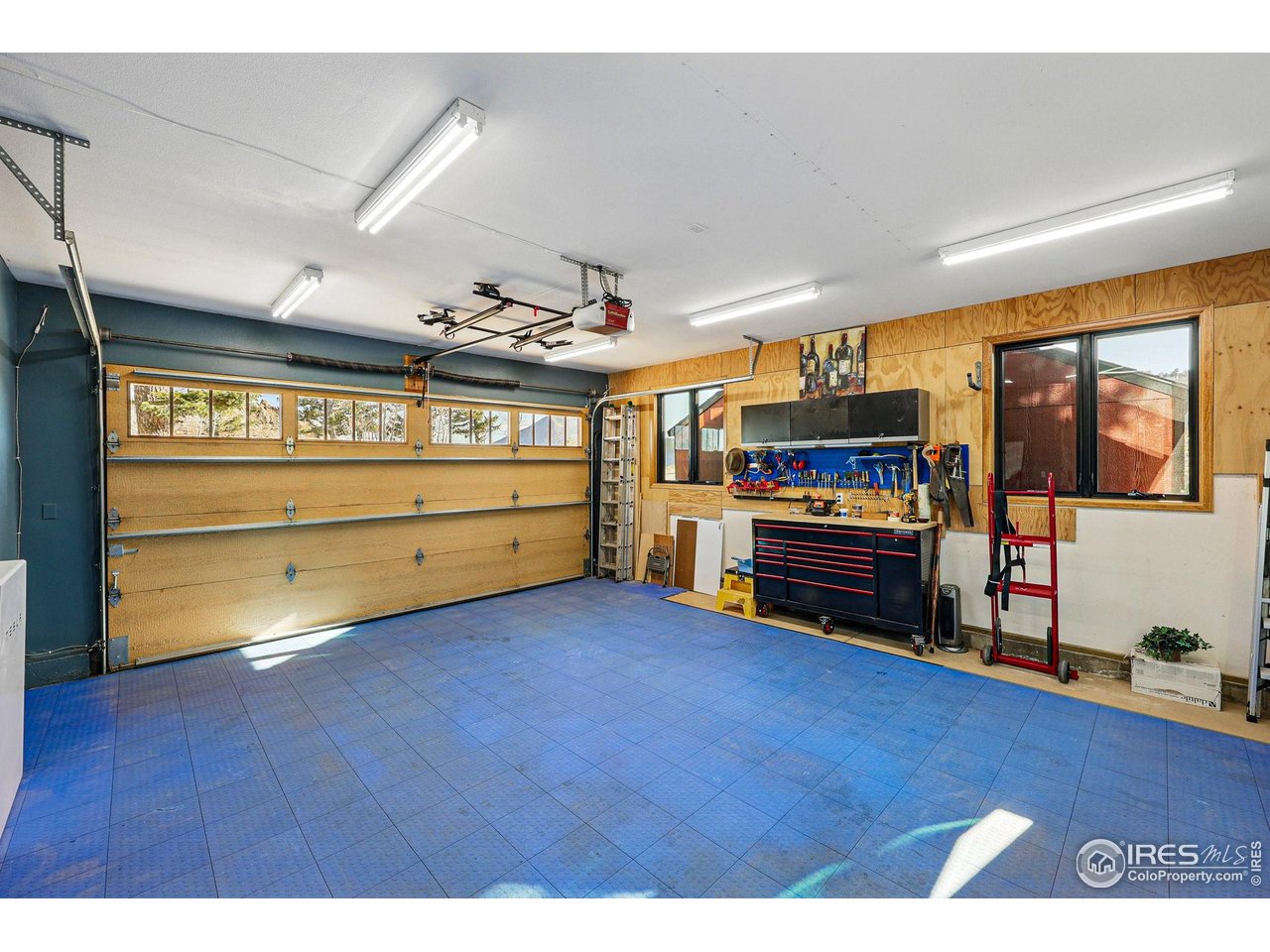 98 Rim Road Boulder, CO 80302 - Photo 37 of 43 Light filled garage with workshop
