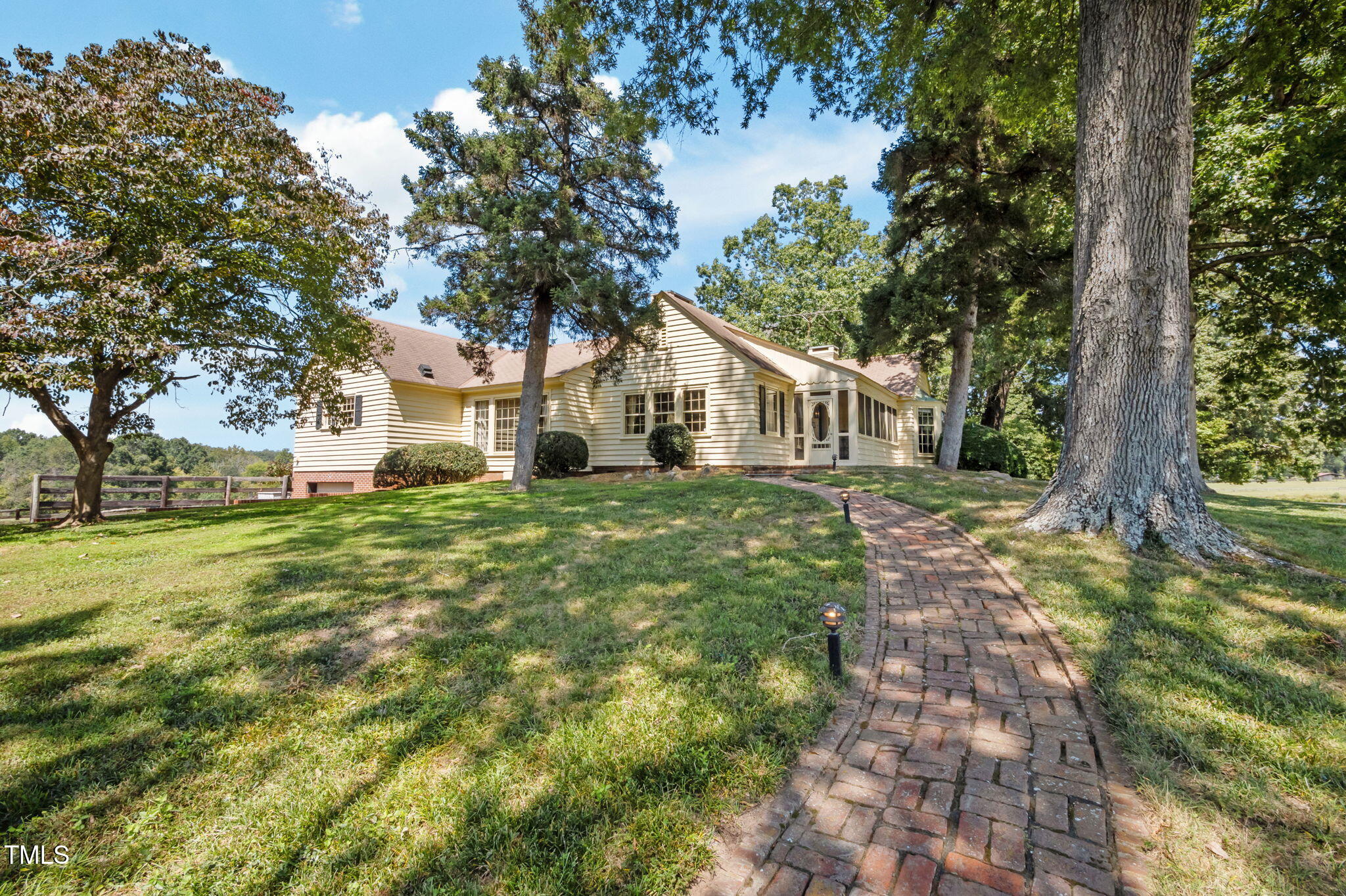 418 Quail Roost Farm Road Rougemont, NC 27572 - Photo 11 of 100 a front view of a house with a yard
