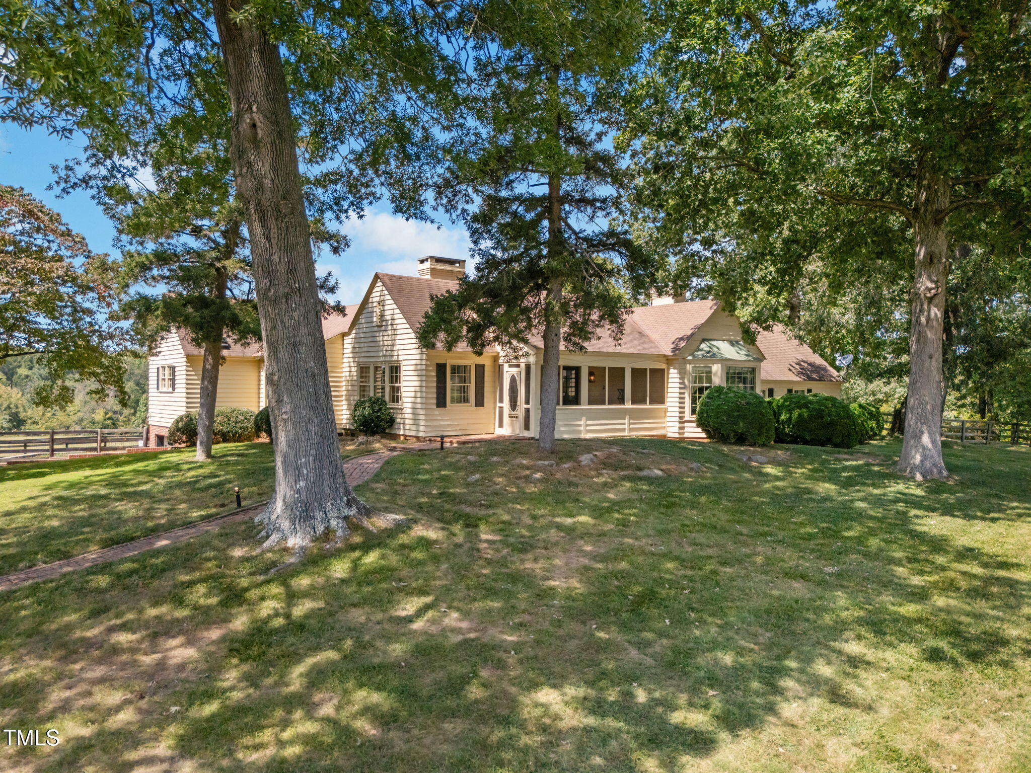 418 Quail Roost Farm Road Rougemont, NC 27572 - Photo 12 of 100 a front view of a house with a garden