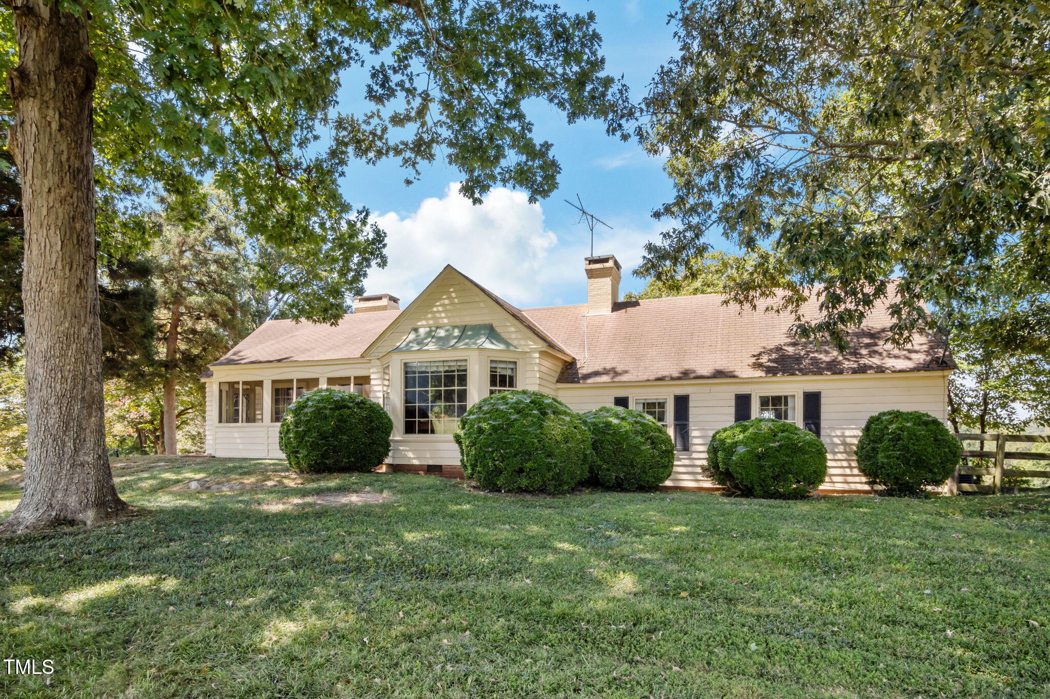 418 Quail Roost Farm Road Rougemont, NC 27572 - Photo 14 of 100 a front view of a house with a garden