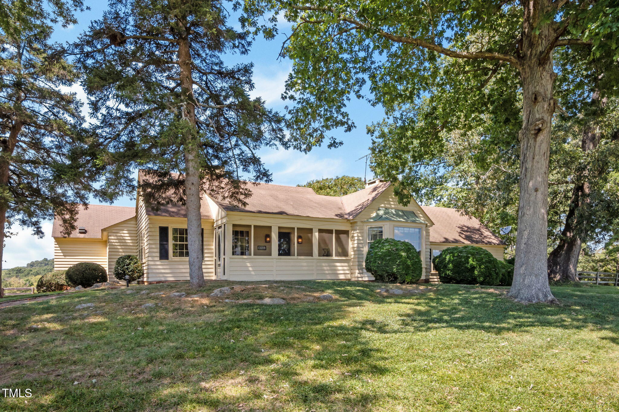 418 Quail Roost Farm Road Rougemont, NC 27572 - Photo 15 of 100 a front view of a house with a garden