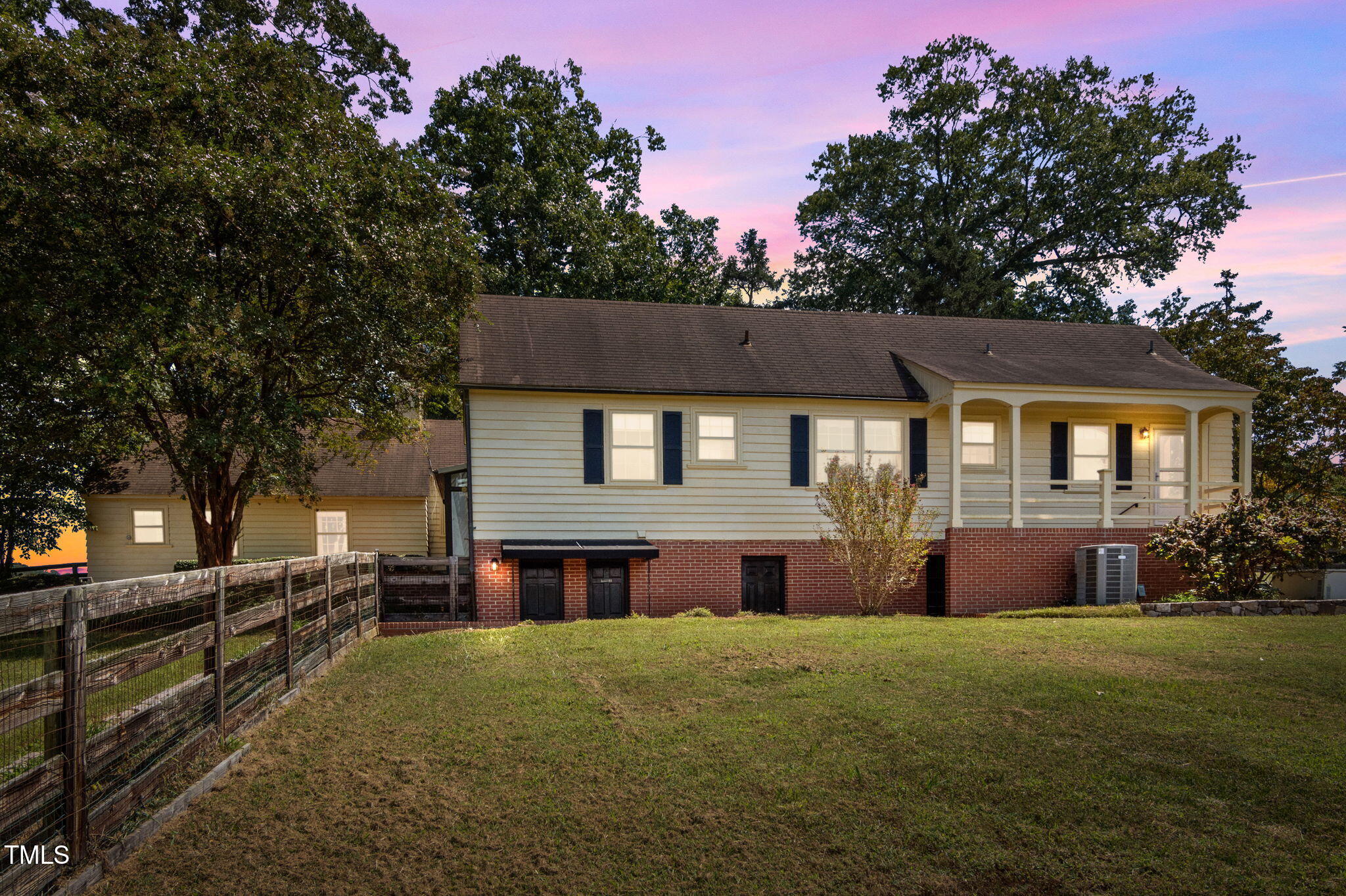 418 Quail Roost Farm Road Rougemont, NC 27572 - Photo 22 of 100 a front view of house with yard and trees in the background
