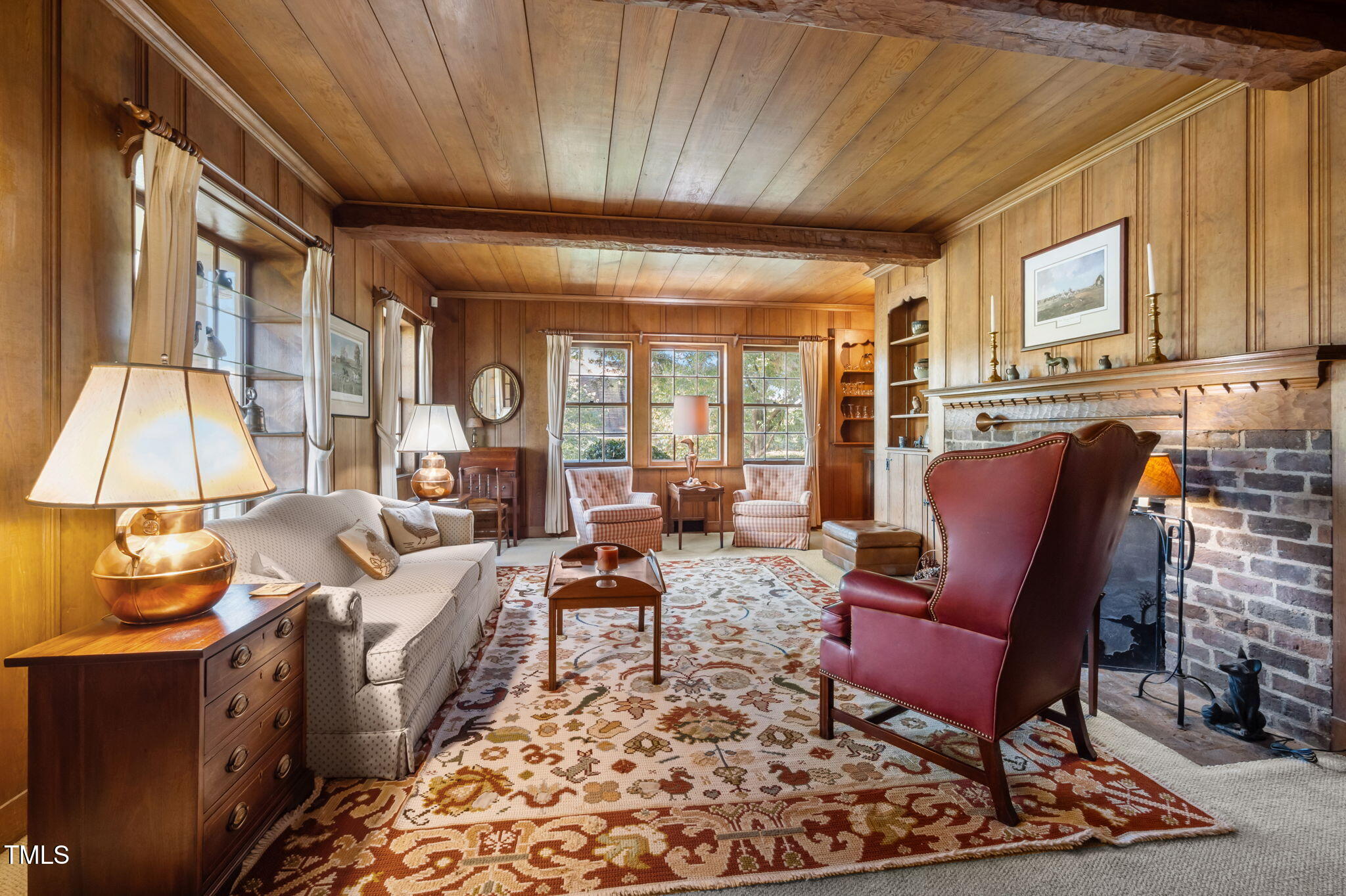 418 Quail Roost Farm Road Rougemont, NC 27572 - Photo 34 of 100 a living room with furniture and a fireplace