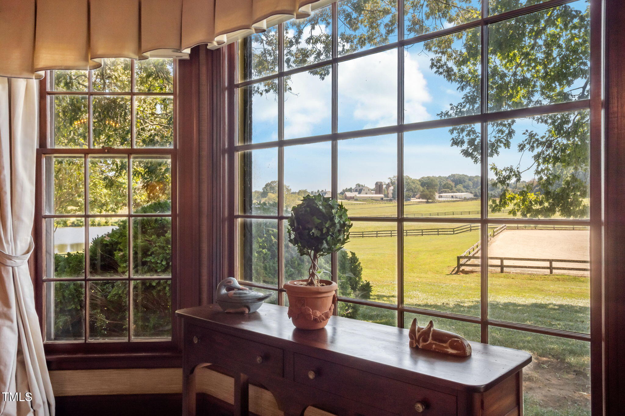 418 Quail Roost Farm Road Rougemont, NC 27572 - Photo 43 of 100 a view of a window with a table and chairs