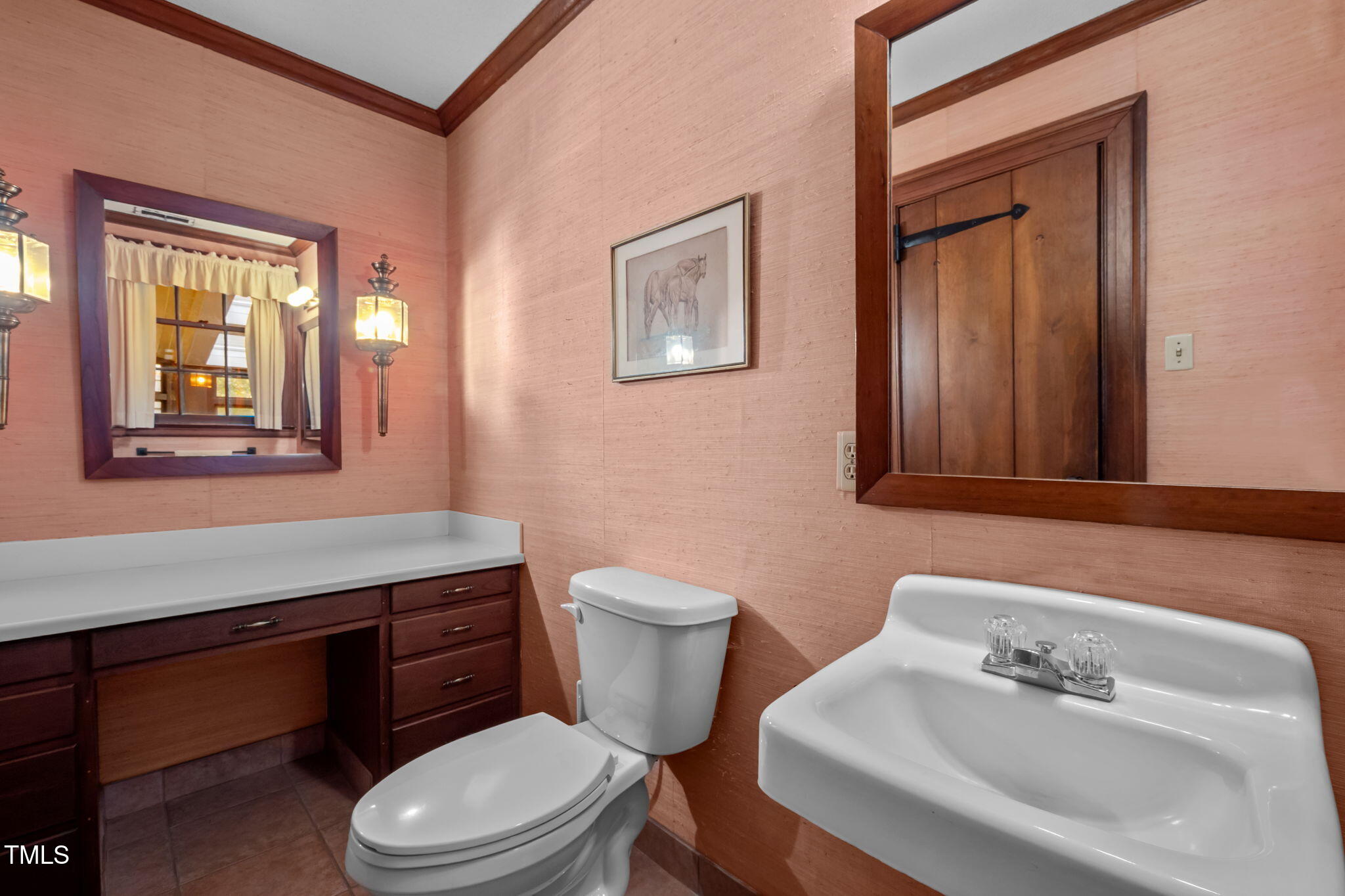 418 Quail Roost Farm Road Rougemont, NC 27572 - Photo 64 of 100 a bathroom with a toilet a sink and mirror