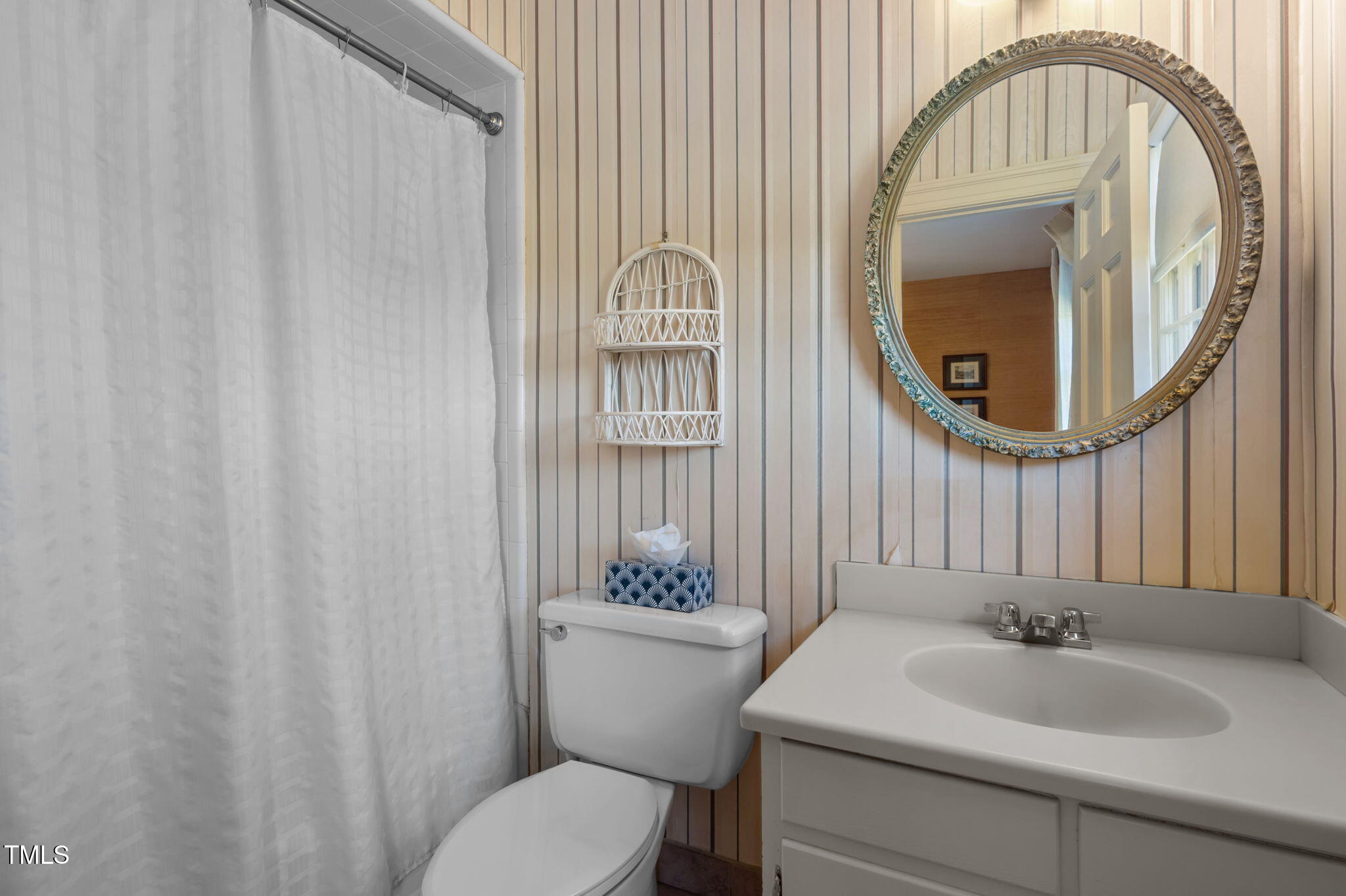 418 Quail Roost Farm Road Rougemont, NC 27572 - Photo 70 of 100 a bathroom with a sink a toilet and a mirror