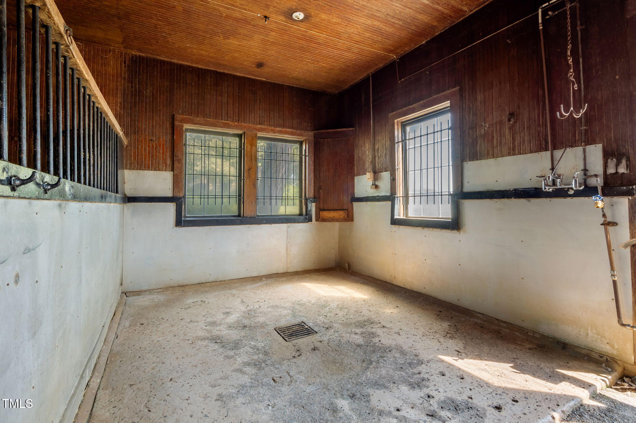 418 Quail Roost Farm Road Rougemont, NC 27572 - Photo 84 of 100 a view of an empty room with wooden floor and a window