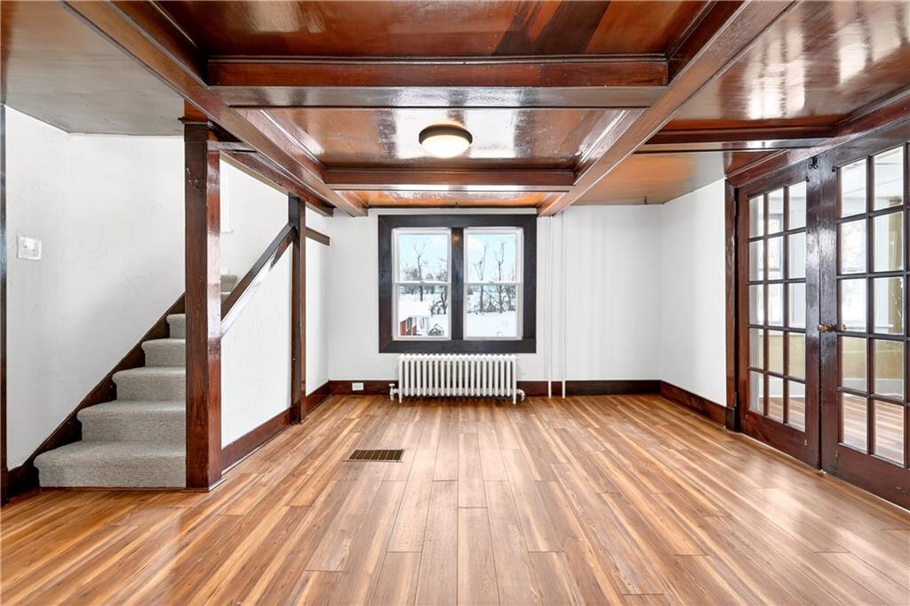 127 Rose Road Mount Pleasant, PA 15666 - Photo 19 of 47 wooden floor in an empty room with a window