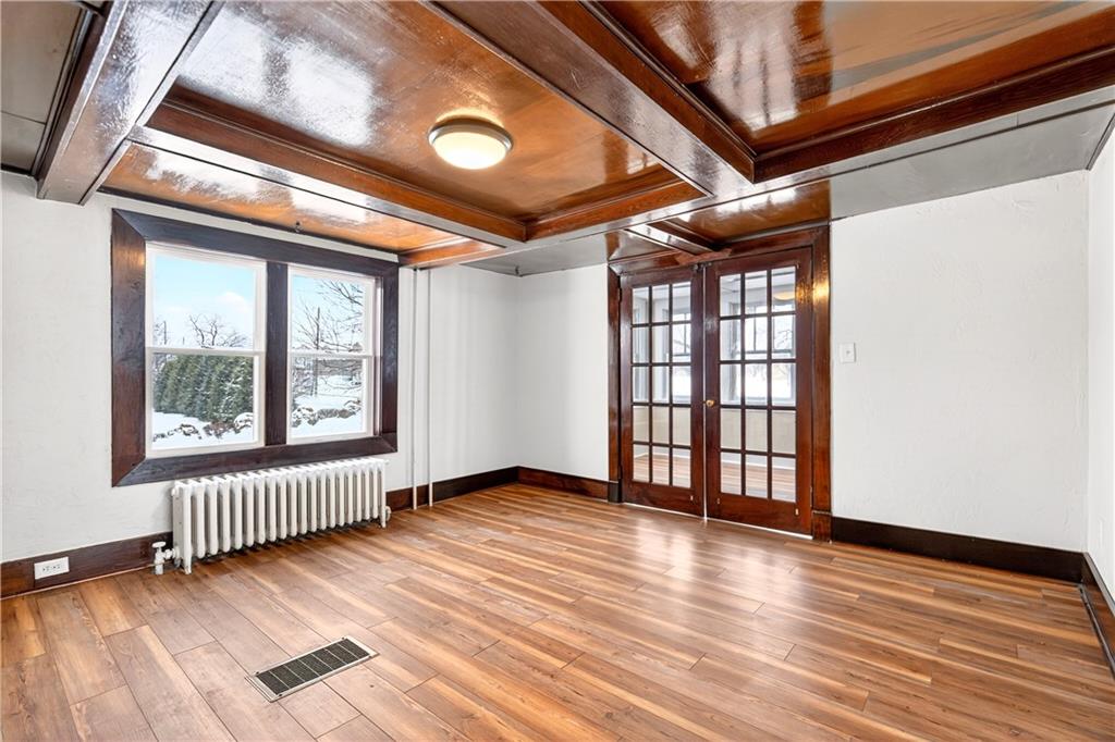127 Rose Road Mount Pleasant, PA 15666 - Photo 21 of 47 an empty room with wooden floor and windows
