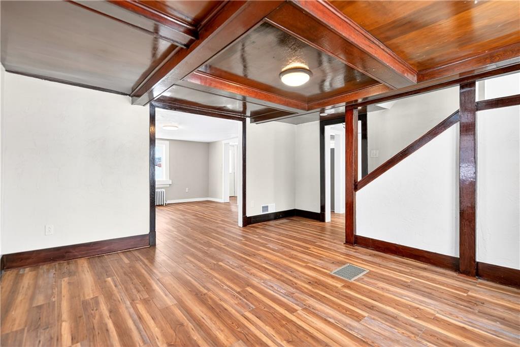 127 Rose Road Mount Pleasant, PA 15666 - Photo 22 of 47 a view of an empty room with wooden floor