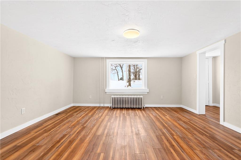 127 Rose Road Mount Pleasant, PA 15666 - Photo 24 of 47 a view of empty room with wooden floor