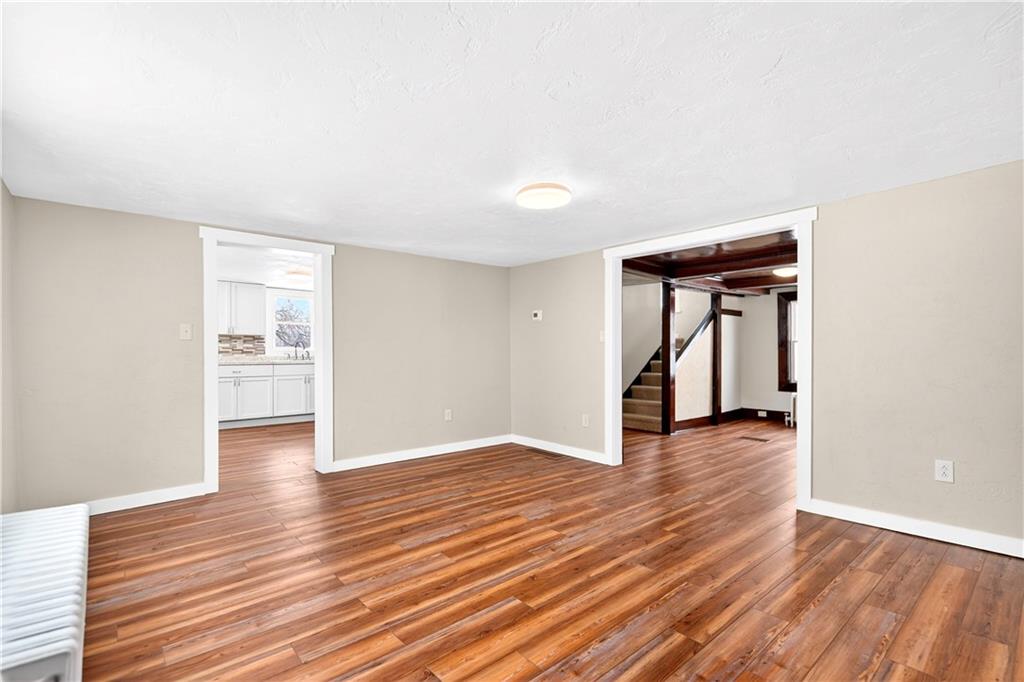 127 Rose Road Mount Pleasant, PA 15666 - Photo 25 of 47 a view of an empty room and wooden floor