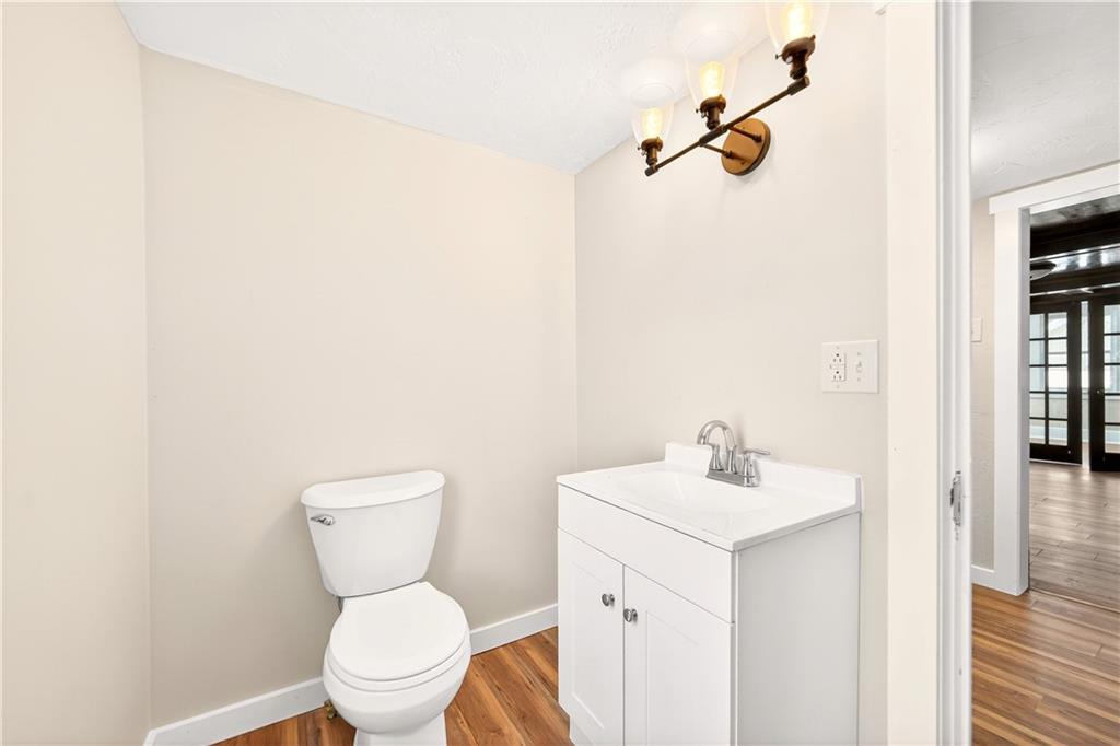 127 Rose Road Mount Pleasant, PA 15666 - Photo 34 of 47 a bathroom with a toilet sink and mirror