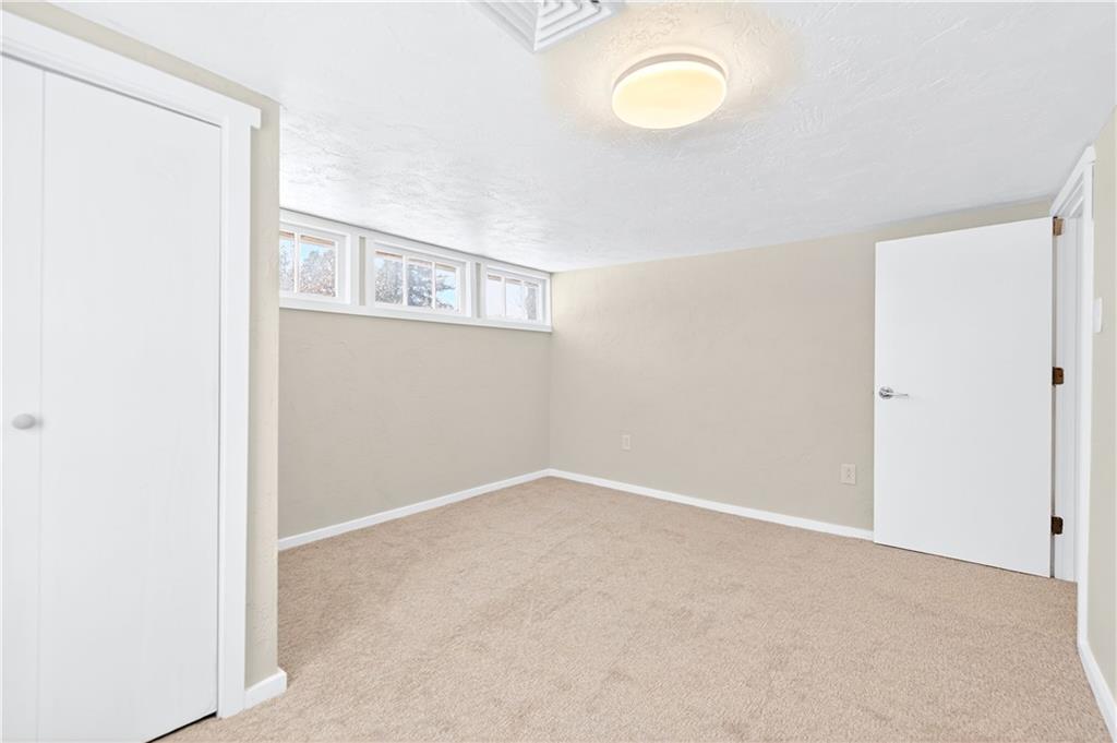 127 Rose Road Mount Pleasant, PA 15666 - Photo 40 of 47 a view of an empty room with a window