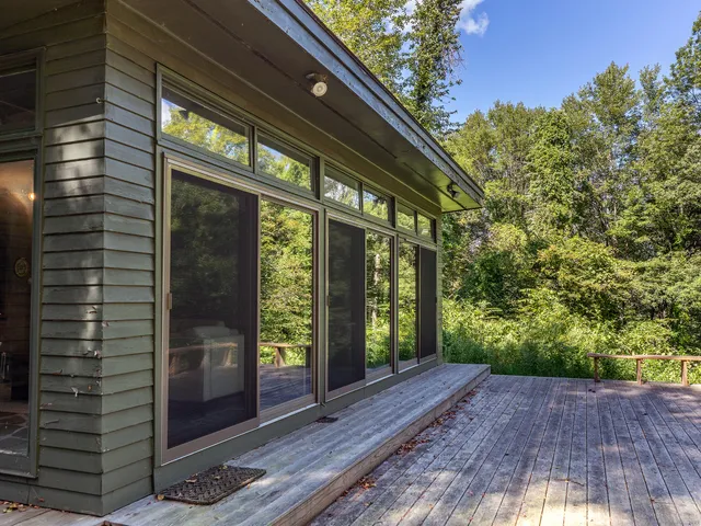 a view of backyard with green space