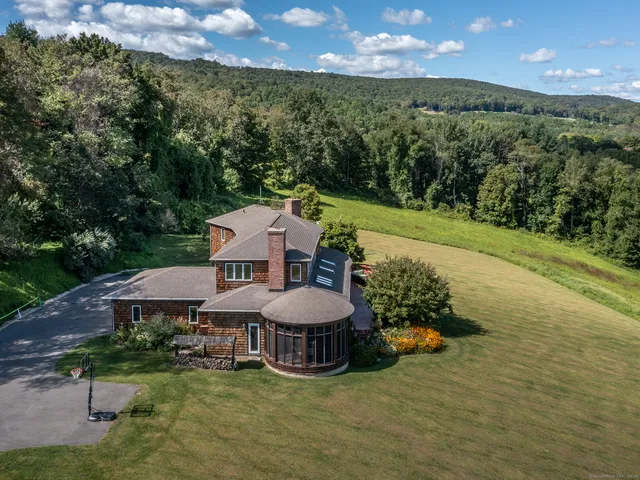 an aerial view of a house with a garden