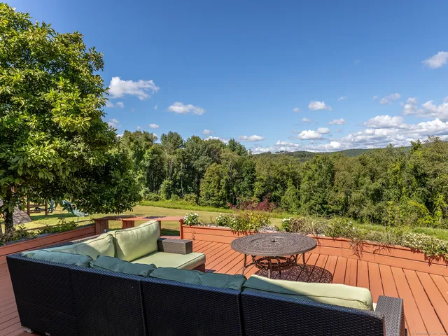 a view of a two chairs in the roof deck