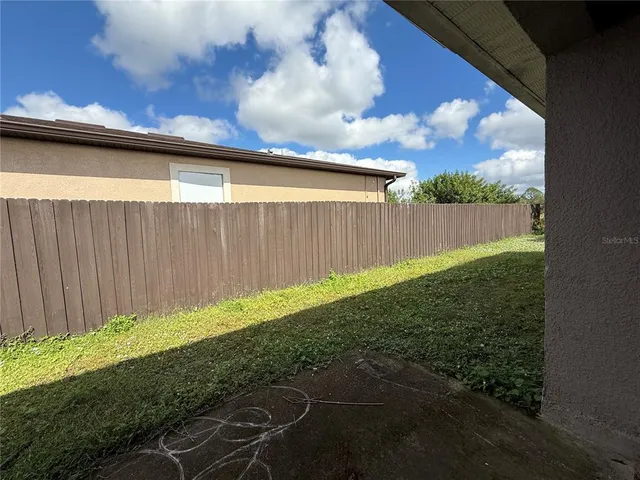a view of yard with seating space