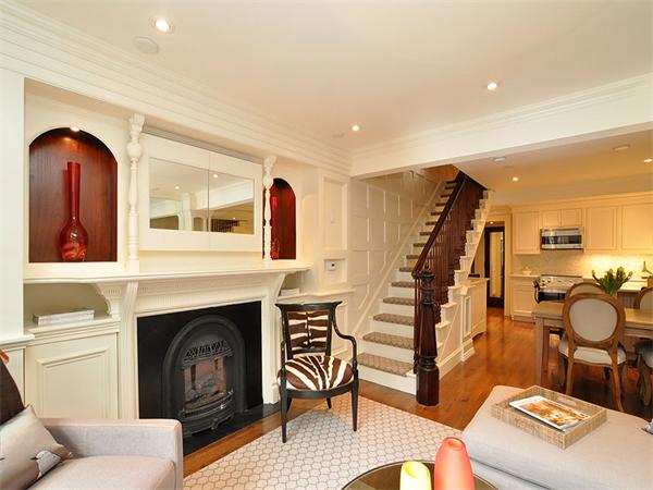 36 Rutland Square Boston, MA 02118 - Photo 21 of 22 a living room with furniture a rug and a fireplace