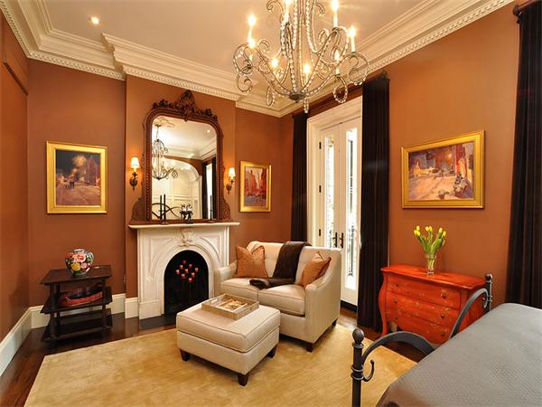 36 Rutland Square Boston, MA 02118 - Photo 9 of 22 a living room with furniture a fireplace and a chandelier