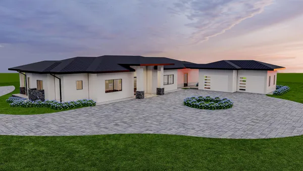 a front view of a house with a garden and plants