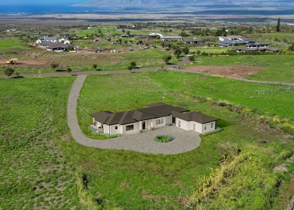 a view of a swimming pool with a yard