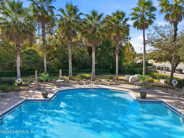 a picture of a bench in front of a wall
