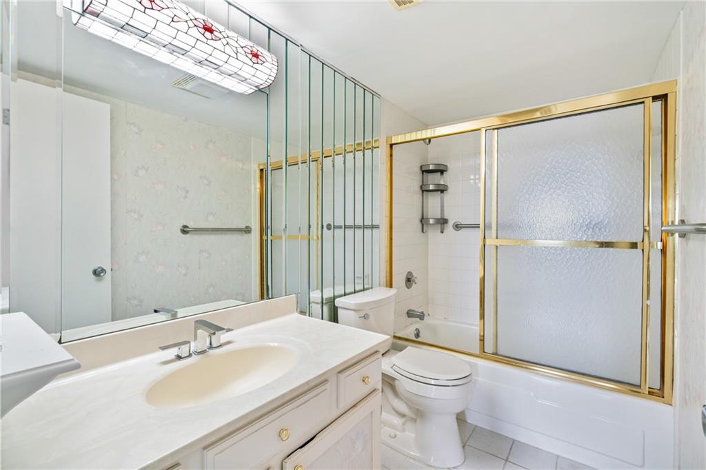 5600 Munhall Road, Unit 606 Pittsburgh, PA 15217 - Photo 12 of 19 a bathroom with a sink toilet and shower