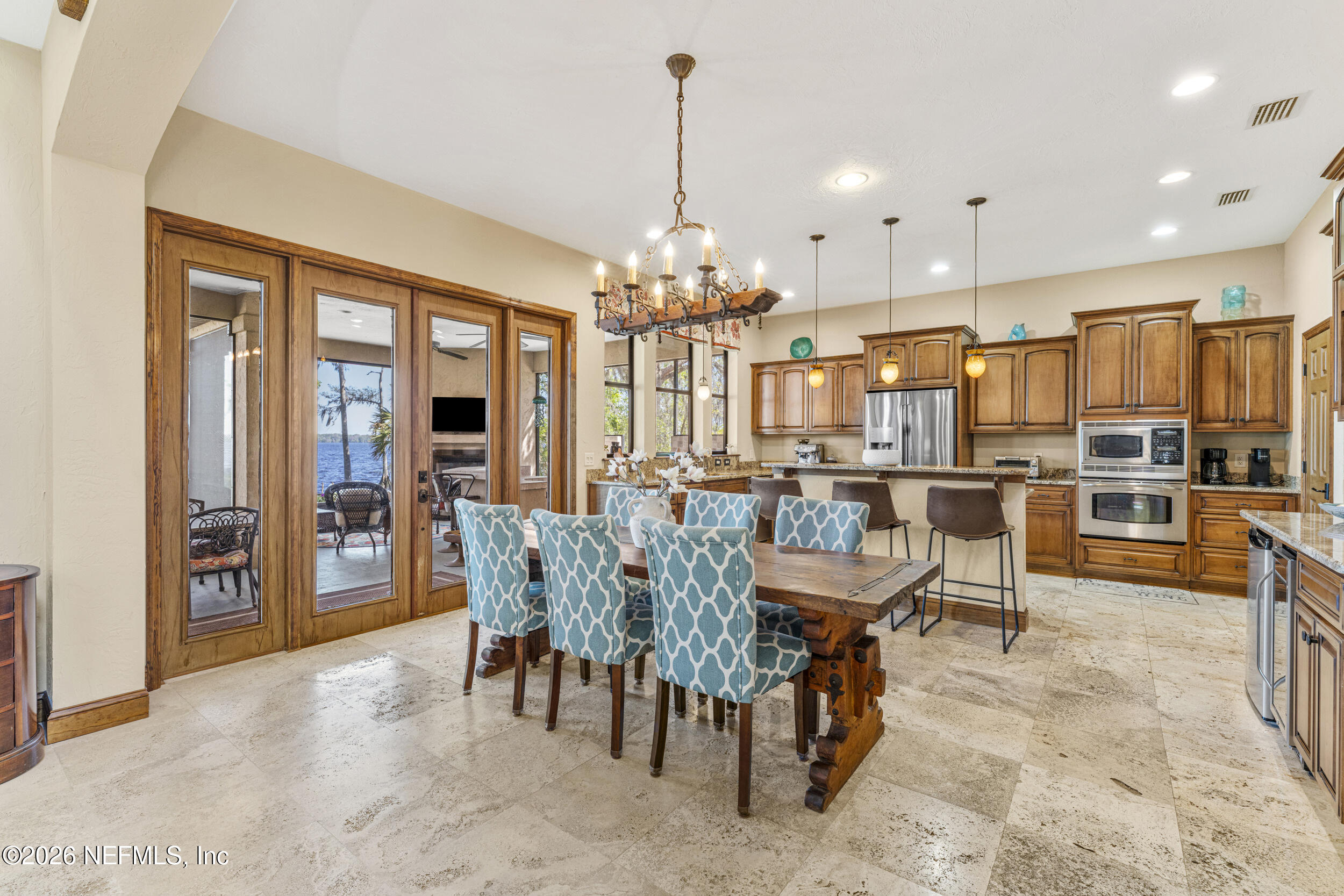 530 Clifton Road Crescent City, FL 32112 - Photo 15 of 68 a view of a dining room with furniture and chandelier