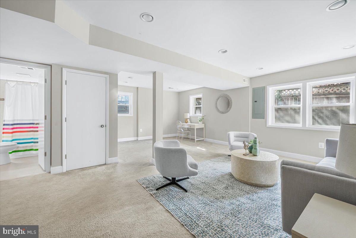 9805 Gardiner Avenue Silver Spring, MD 20902 - Photo 20 of 34 a living room with furniture and window