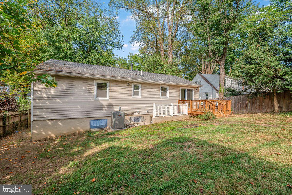 9805 Gardiner Avenue Silver Spring, MD 20902 - Photo 29 of 34 a backyard of a house with table and chairs