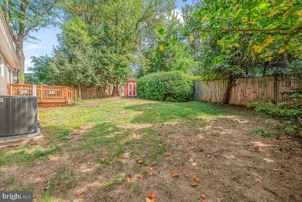 9805 Gardiner Avenue Silver Spring, MD 20902 - Photo 30 of 34 a view of a backyard with a small cabin