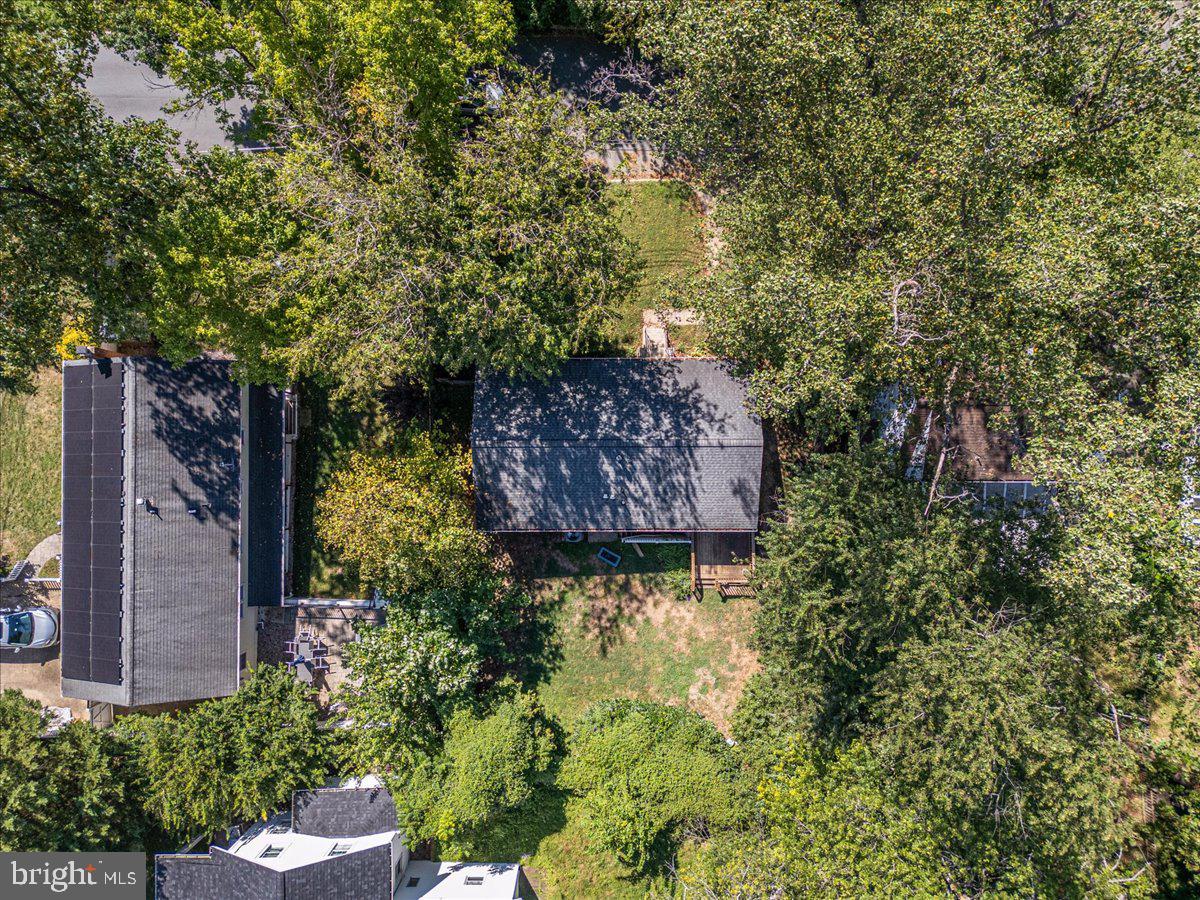 9805 Gardiner Avenue Silver Spring, MD 20902 - Photo 31 of 34 a backyard of a house with lots of green space