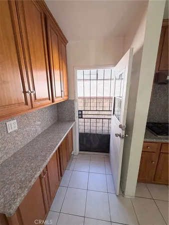 a kitchen with a refrigerator a sink and dishwasher