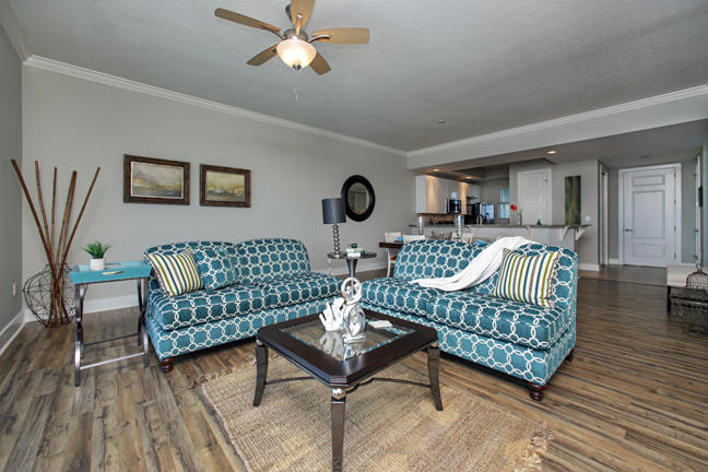 211 Durango Road, Unit 516 Destin, FL 32541 - Photo 4 of 27 a living room with furniture and a wooden floor
