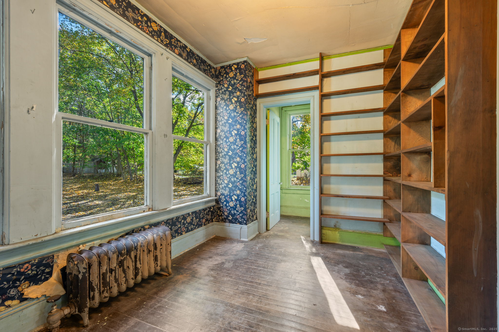 124 River Road Willington, CT 06279 - Photo 13 of 38 a view of an empty room with a window